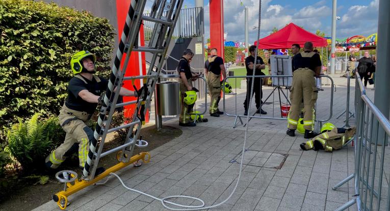 Firefighters at our charity ladder climb in Leeds